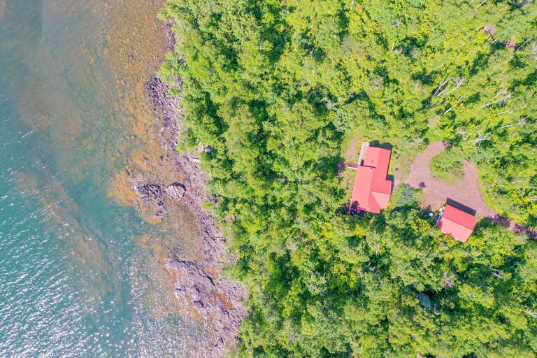 The shoreline area is just a short stroll away from the home.