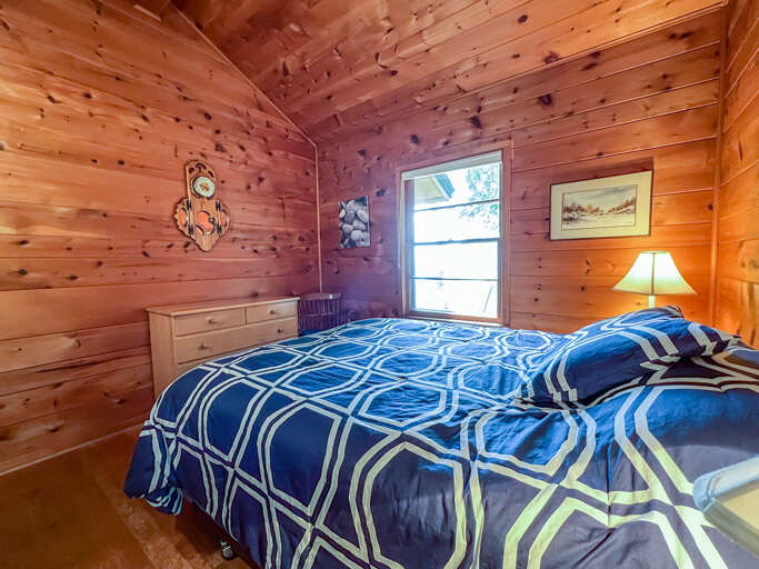There are peek-a-boo views of Lake Superior from the window in Bedroom 1.