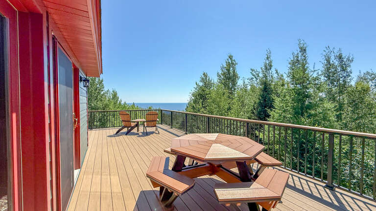 Enjoy a meal on the lake-facing deck.