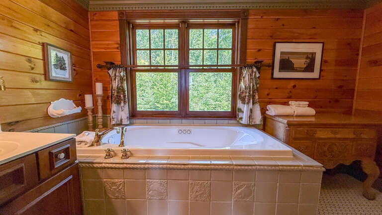 Soaker tub in Bathroom 1.