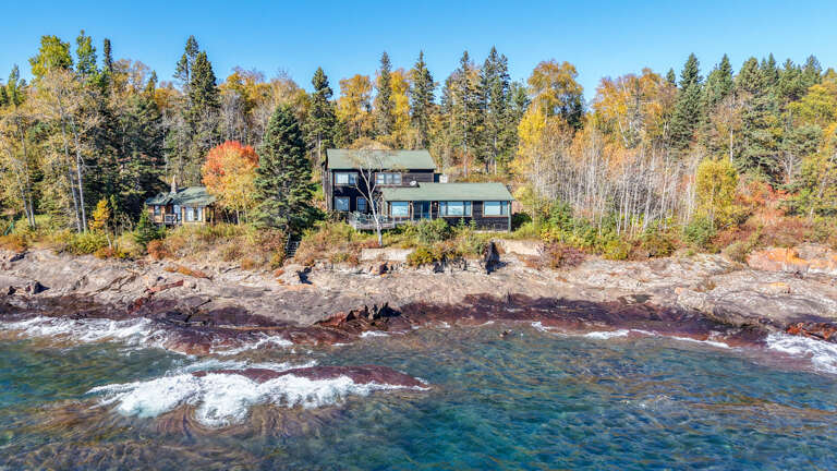 Enjoy everything that the Lake Superior shoreline has to offer at this spacious, luxury home.