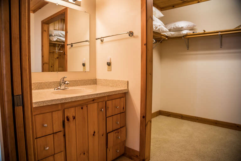 The Bedroom 1 features a walk in closet.