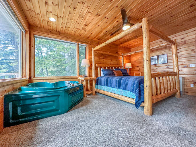 Bedroom 1 has a king bed and in-room jetted tub.