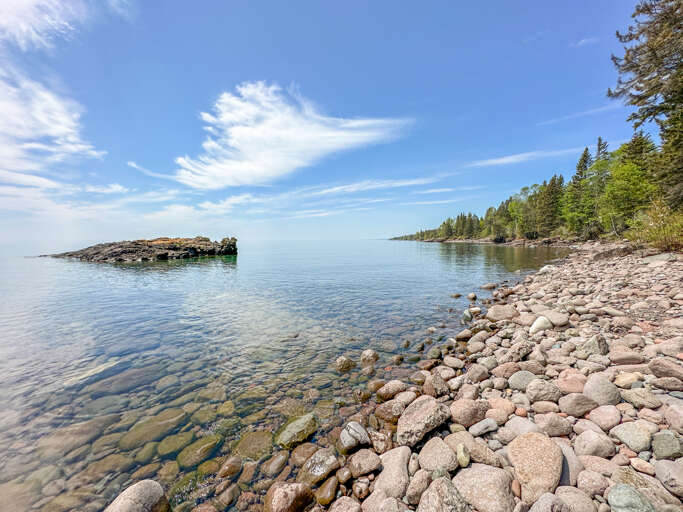 The beach is perfect for taking a stroll and dipping your toes in the water.