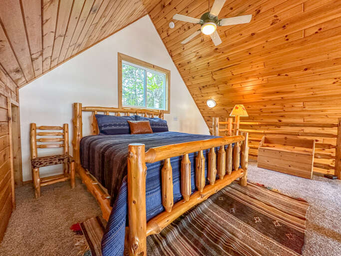 There is a King bed in the loft bedroom.
