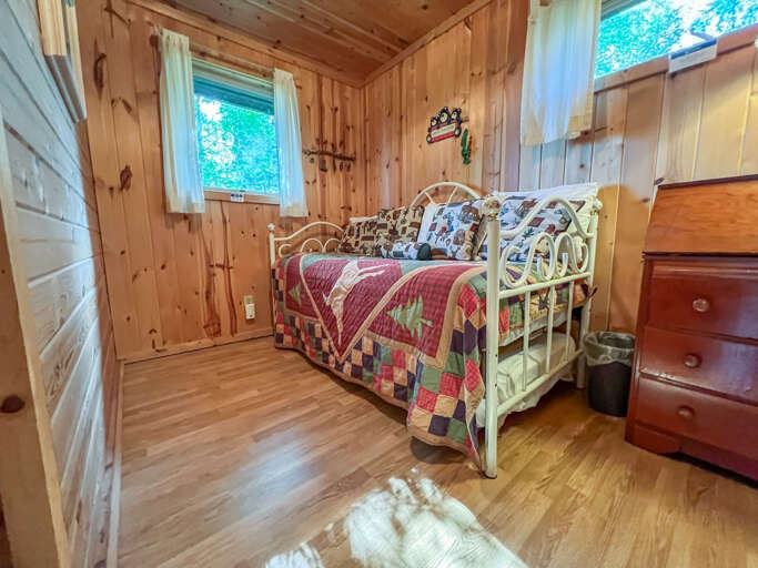 Bedroom 2 has a twin bed and a twin trundle bed