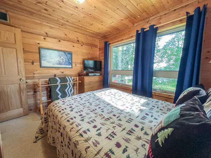 This bedroom also has a TV/DVD player