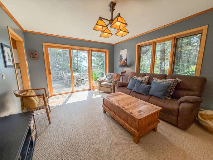 Door leading to the lakeside deck from the living room Door leading to the lakeside deck from the living room