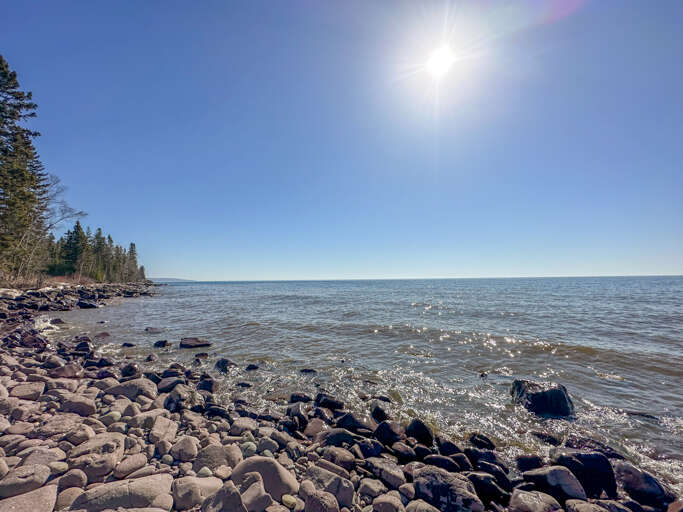 Take a stroll down to the private shoreline area.