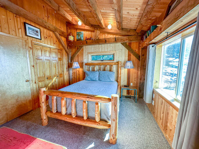 The Bedroom 1 features a wood hand carved queen bed. The Bedroom 1 features a wood hand carved queen bed.
