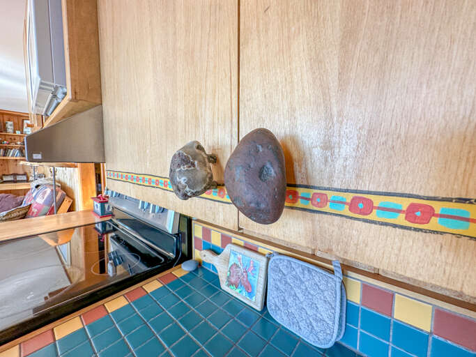 The kitchen has some unique North Shore details like these Lake Superior Rock cabinet handles. The kitchen has some unique North Shore details like these Lake Superior Rock cabinet handles.