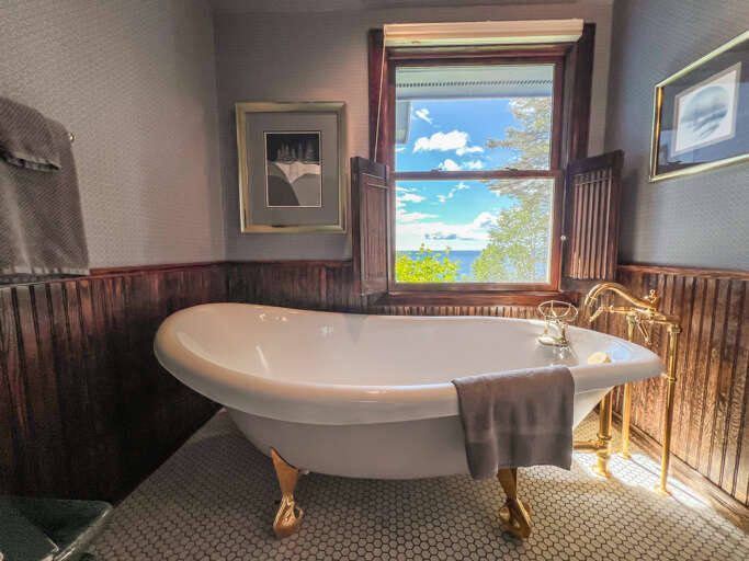 Enjoy Lake Superior views while soaking in the clawfoot bathtub.