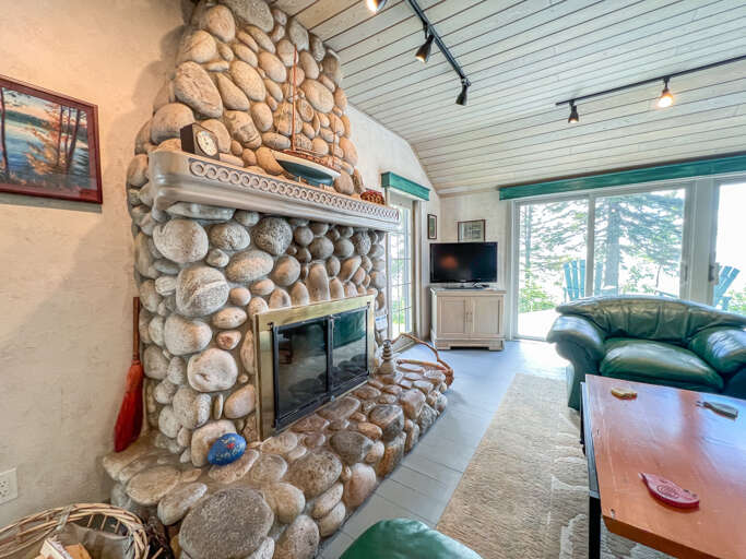 Watch TV while enjoying a fire in the fireplace.