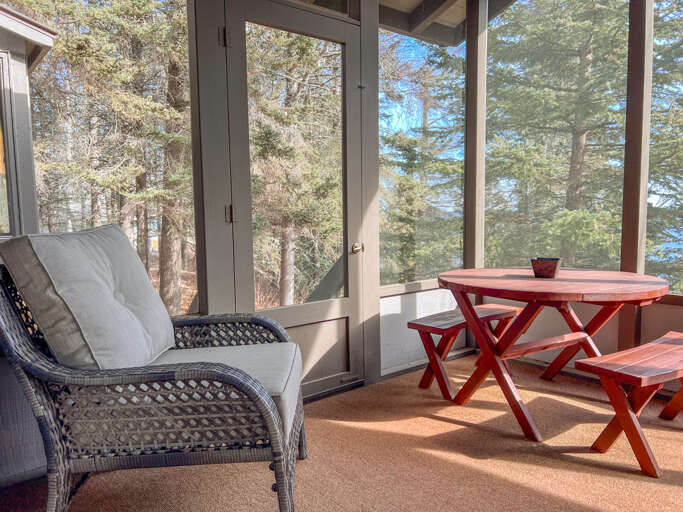 Relax in the screened-in porch.