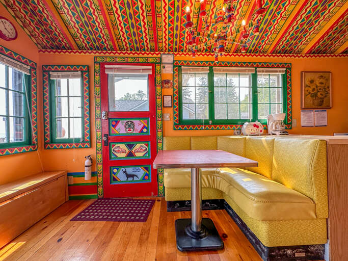 Enjoy the unique decor including this booth-style dining table. Enjoy the unique decor including this booth-style dining table.