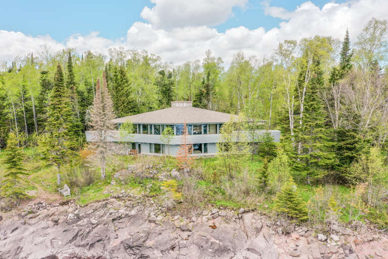 This 3 bedroom, 3 bathroom home is located a short drive up the shore of Lake Superior from the quaint lakeside town of Grand Marais.