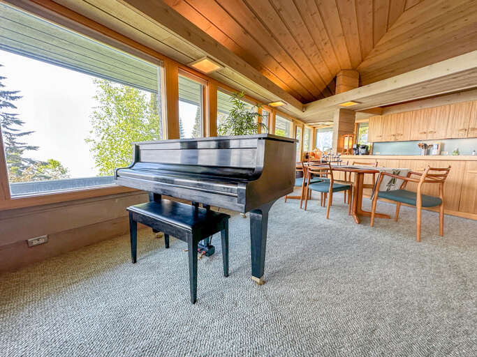 There is a piano in the living room.