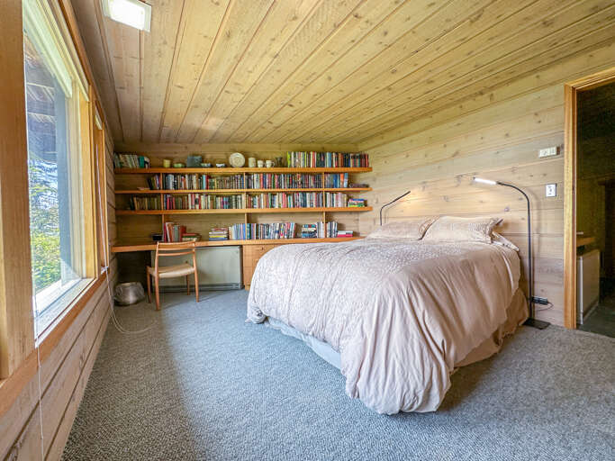Bedroom 3 also has a queen bed and is located on the lower level.