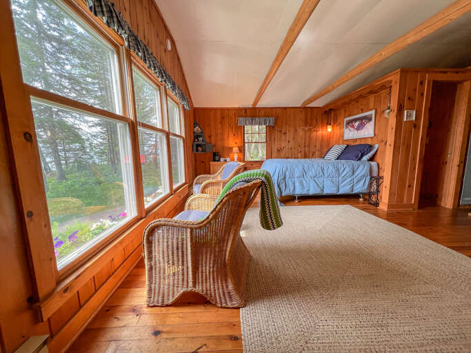 The guests' cottage sleeps two in an open studio-style layout.