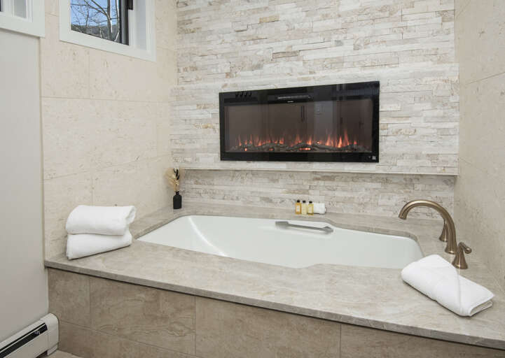 Primary Bathroom w/ Fireplace