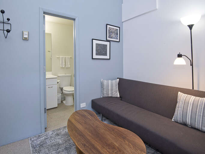 Sitting Area in Bedroom w/ TV