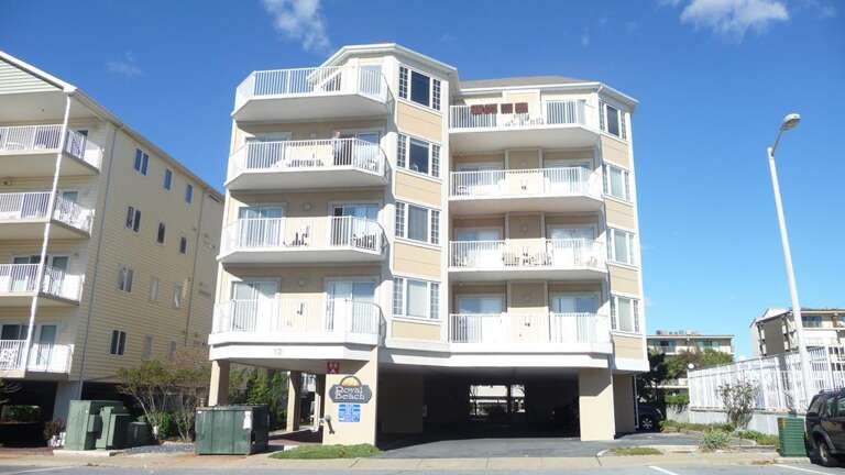 Bright Building, Balconies, Blue Sky Backdrop