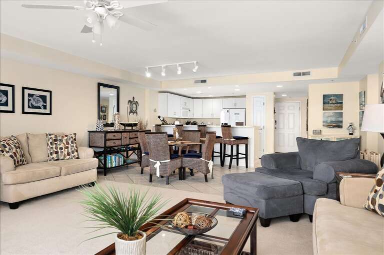 Spacious Living Space Seamlessly Transitions To Kitchen Area In Vacation Rental