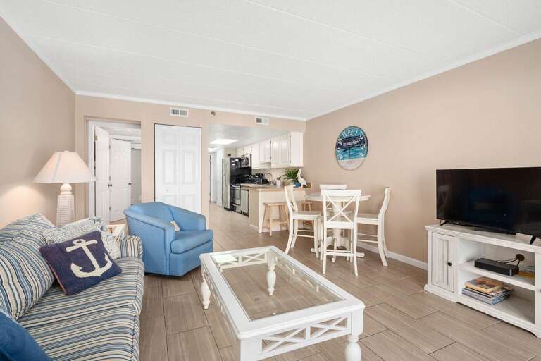 Spacious Suite Showing Soft Sofas, Slick Surfaces, Subtle Seaside Shades