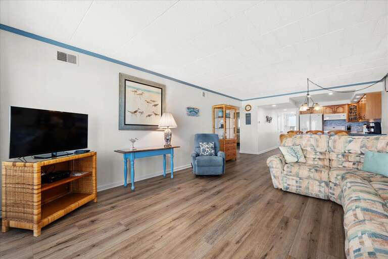 Bright Beach-themed Living Space In A Vacation Rental With Nautical Decor