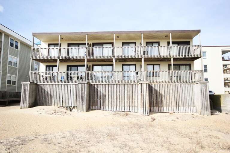 Beachfront Building With Balconies Facing The Sand