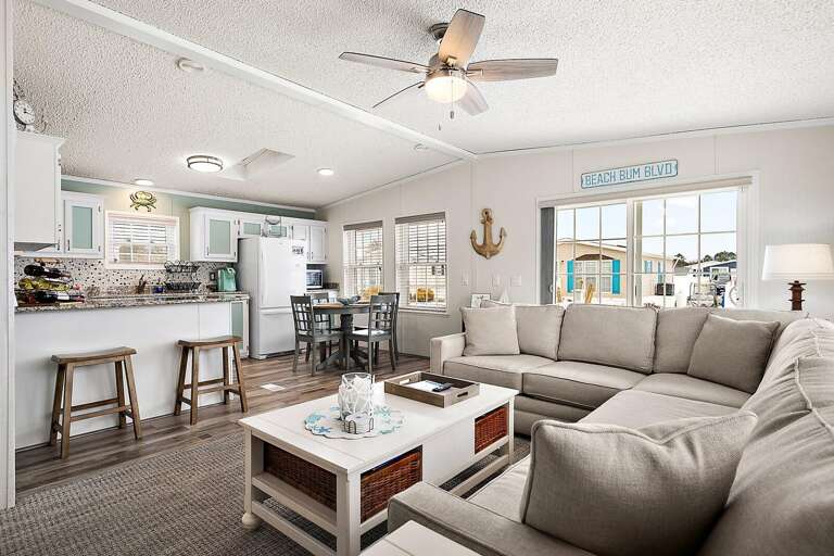 Spacious Living Space Sporting Sleek Surfaces And Subtle Shades