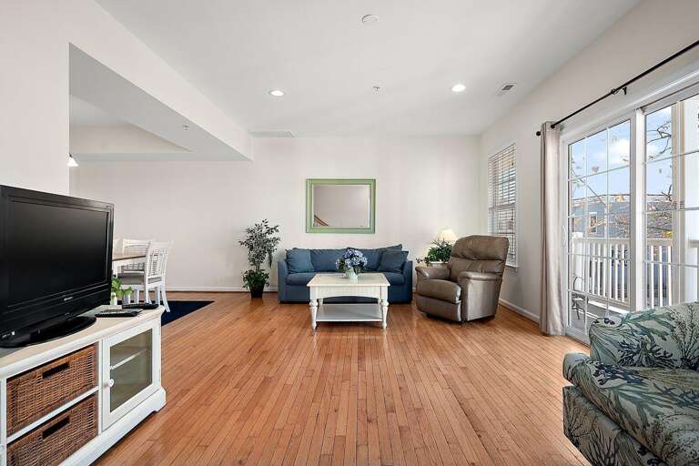 Spacious Living Space With Sleek Seats And Sliding Doors