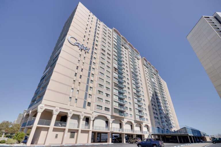 High-rise Building Under Blue Skies