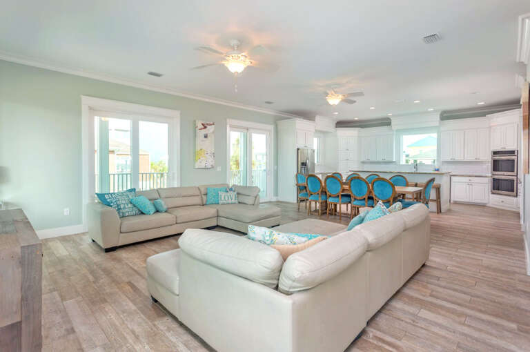 Living Room Interior In Vacation Rental With Kitchen View