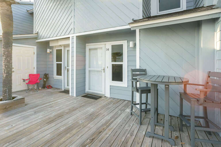 Sunset-lit Spacious Deck With Seats And Sliding Doors