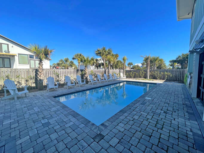 Poolside Panorama At A Palm-bordered Vacation Rental