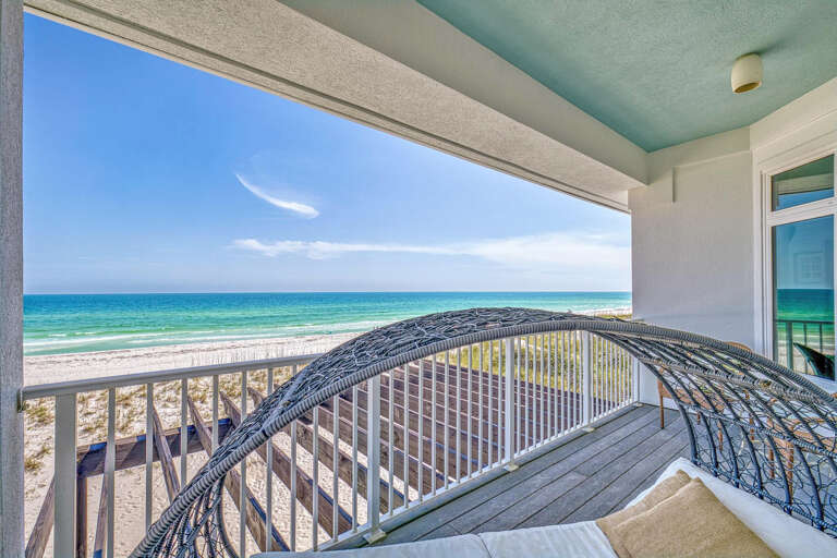Balcony View Of Blue Beach And Bright Sky