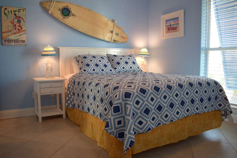 Bedroom 2 has 1 queen bed.