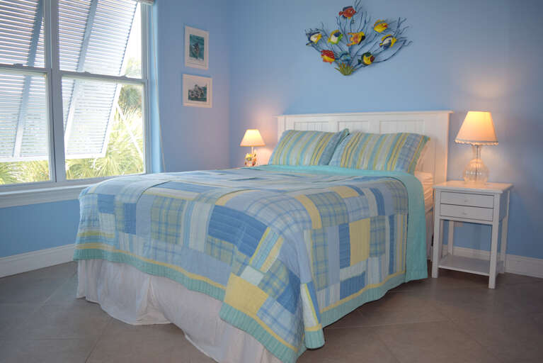 Bedroom 1 is on the main level and has 1 queen bed and shares the jack and jill bathroom.