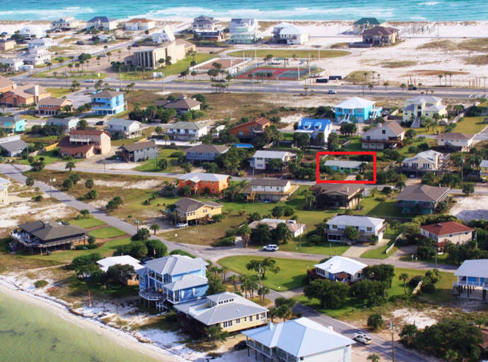 This aerial view show the home is close to the Sound and the Gulf.