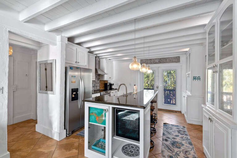Interior Of A Vacation Rental Kitchen With Stainless Steel Appliances