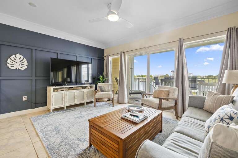 Living Room With Furniture And Sliding Doors To Balcony