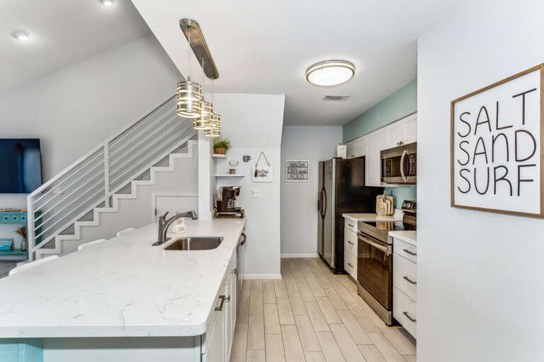Interior Of Vacation Rental Kitchen With Staircase