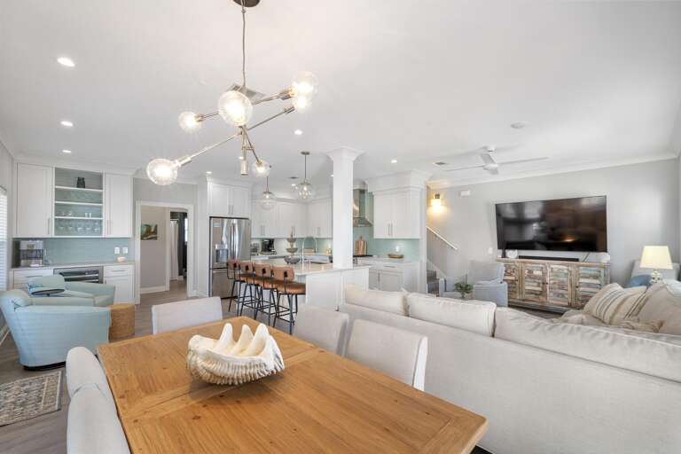 Bright Living Space Linking Lounge, Kitchen, And Dining Areas