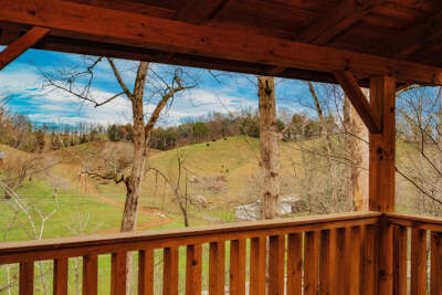 View From Wooden Porch Overlooking Pastoral Landscape