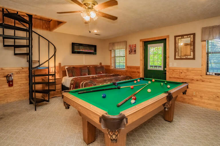 Room With Pool Table, Spiral Staircase, Ceiling Fan