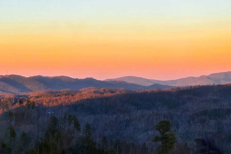 Sunset Silhouettes Sweeping Serene Hills