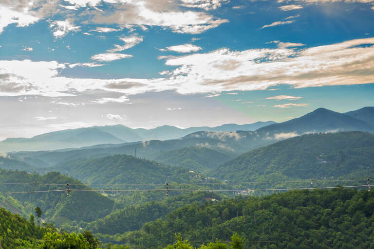 Misty Mountains Under Morning Skies, Scenic View Suitable For A Serene Vacation Rental Setting