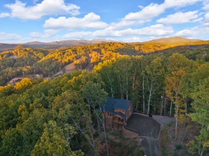 Secluded Structure Surrounded By Autumnal Trees