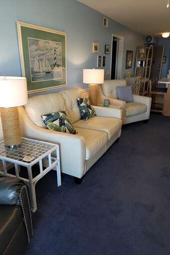 Living Room View Toward Hall & Entrance Living Room View Toward Hall & Entrance